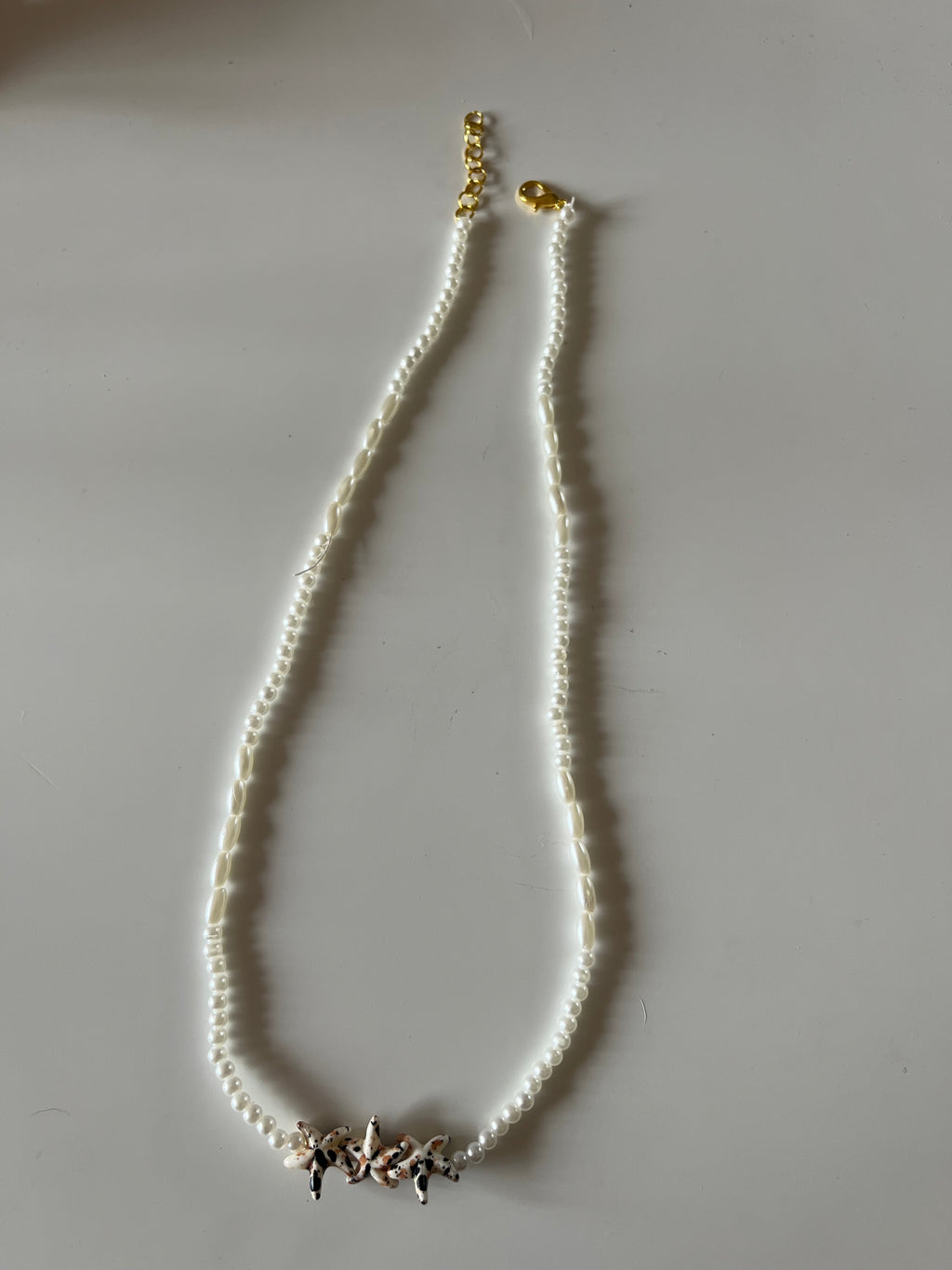 Colgante fino con estrellas de Mar