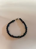 Pulsera cruces